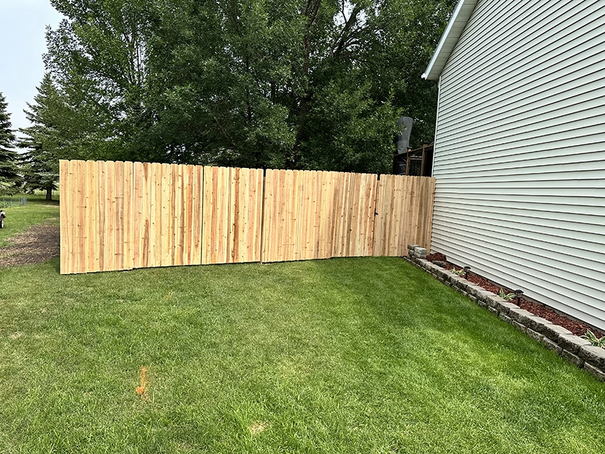 Wood privacy fence installation project in Grand Forks ND
